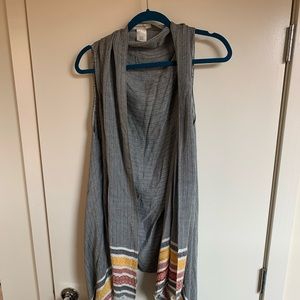 Francesca’s throw over vest